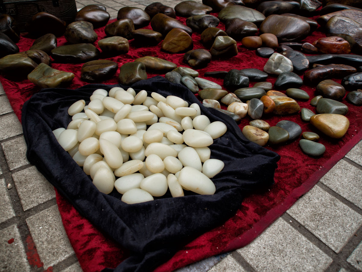 What appears to be Chinese nephrite in Guangzhou's Hualin Street jade market. Lotus Gemology on jade, nephrite, and imitations.