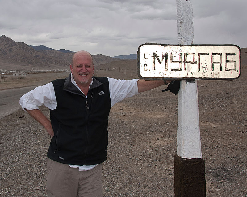 The author on the outskirts of Murgab, in the remote Badakhshan region of Tajikistan. Imagine a photo of you next to the sign.