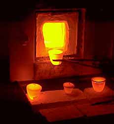Figure 7  Möng Hsu rubies emerging red-hot from the Mae Sai oven of Somkual Plylaharn; June 1997. (Photo: R.W. Hughes)
